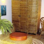 16c CASA PAVÃO - Spacious main bedroom with rattan furniture