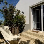 17 CASA PAVÃO - Patio in front of the main bedroom with panorama view over the hills and down to the sea