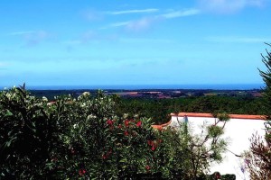 18b CASA PAVÃO - Panorama view towards the ocean from the conservatory and inside the house